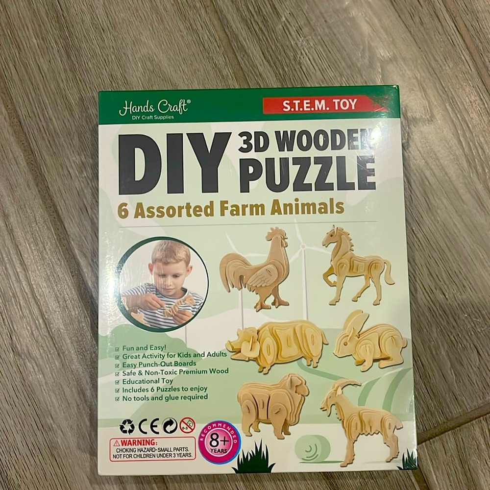 Brand new, Never been opened. 6 Farm 3D puzzle wooden animals